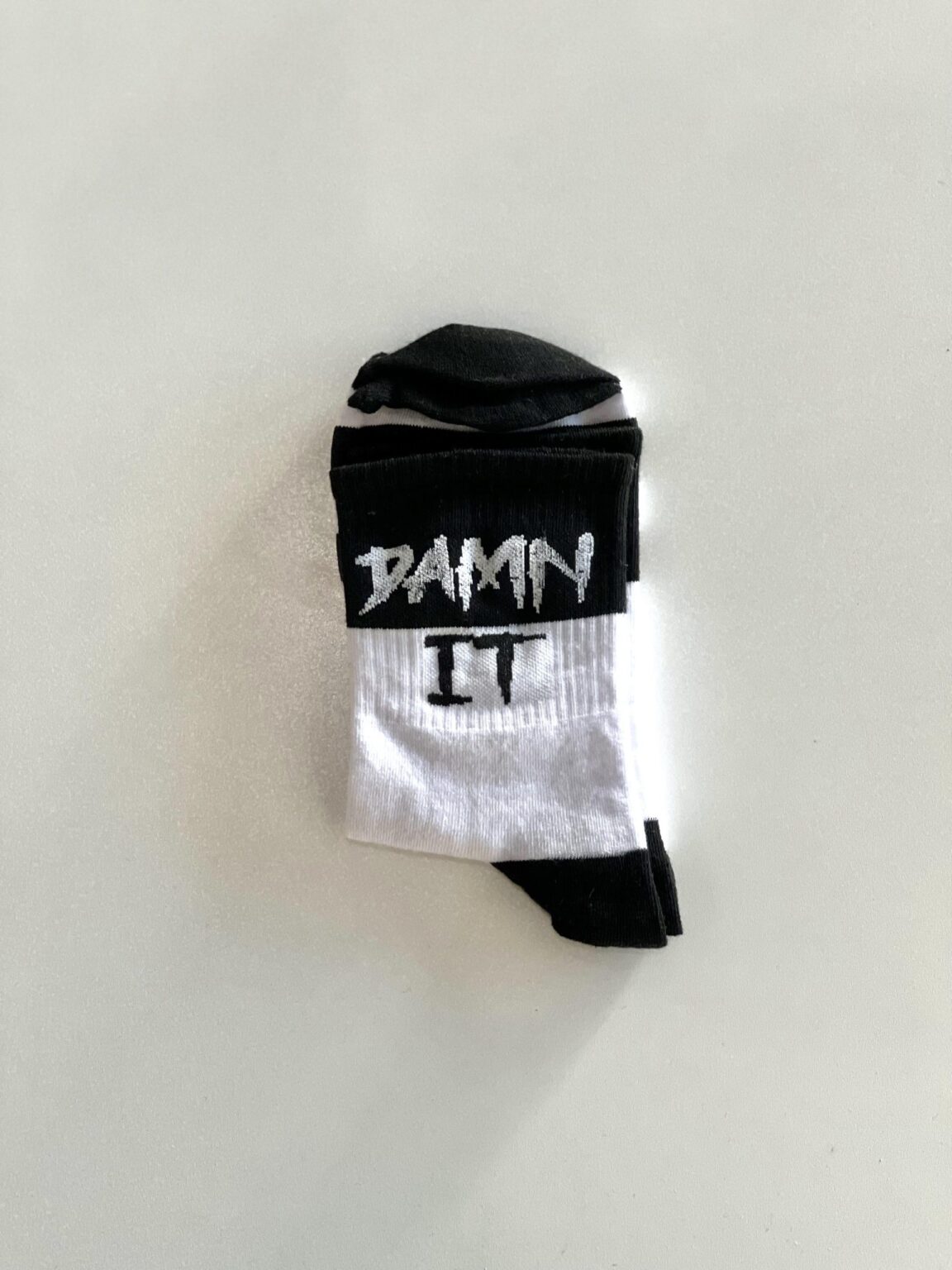 جوراب سفید مشکی damn it